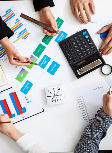 Marketing agency owner reviewing retainer income and project profitability
